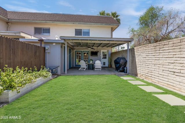 8135 N Central Ave Unit 1, Phoenix, AZ 85020 - rear view of house with a ceiling fan, a patio, and brick siding