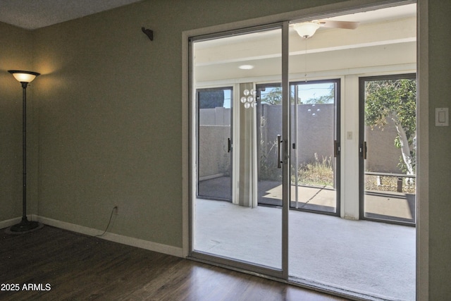 3345 E University Dr Unit 2, Mesa, AZ 85213 - doorway with dark wood-type flooring and baseboards