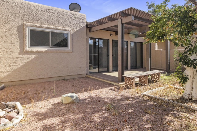 3345 E University Dr Unit 2, Mesa, AZ 85213 - rear view of property featuring stucco siding and a pergola