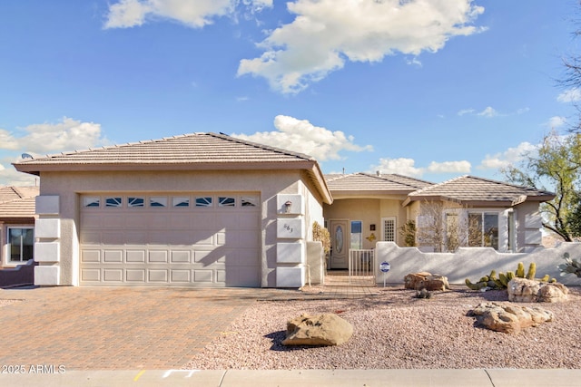 view of front of property featuring a garage