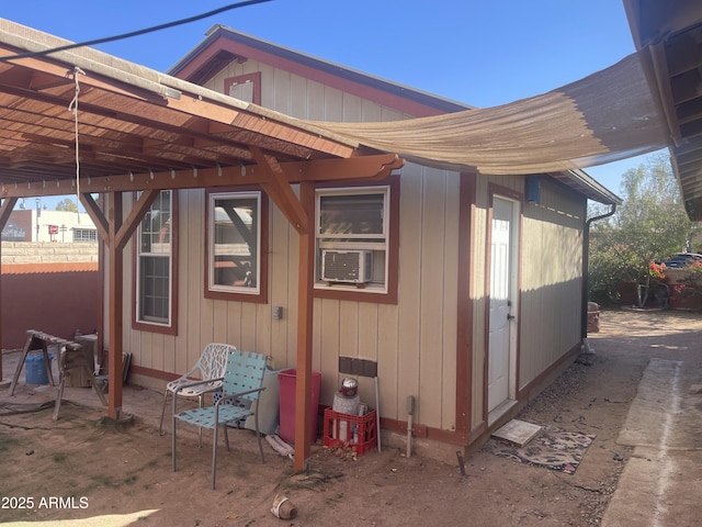 view of outbuilding featuring cooling unit