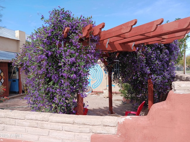 exterior space featuring a pergola