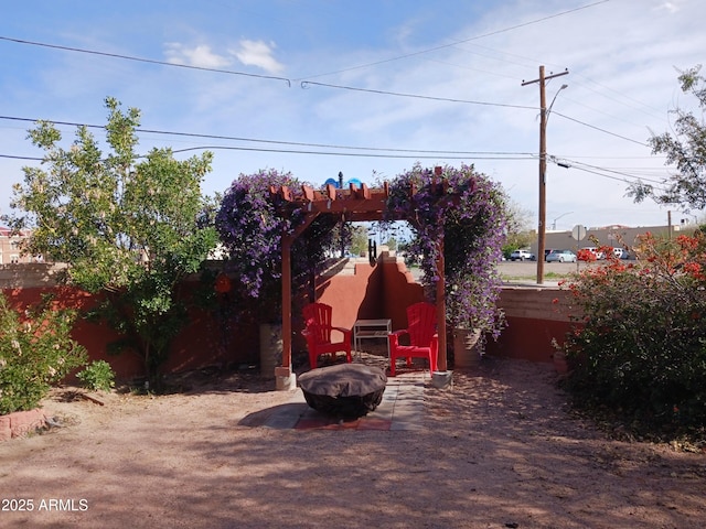 exterior space featuring a fire pit