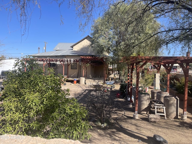 back of property featuring a patio