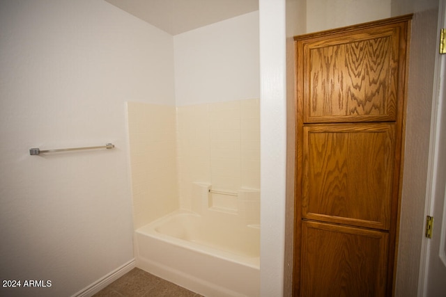 bathroom with tile patterned floors