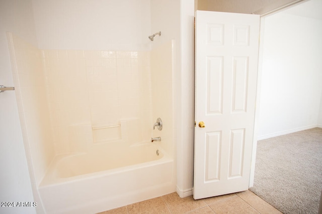 bathroom with shower / tub combination and tile patterned flooring