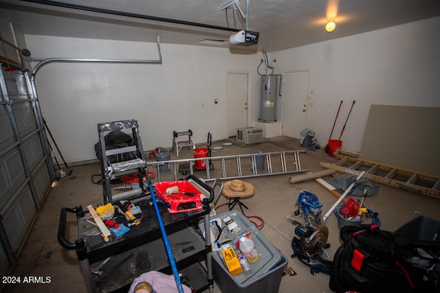 garage with water heater and a garage door opener