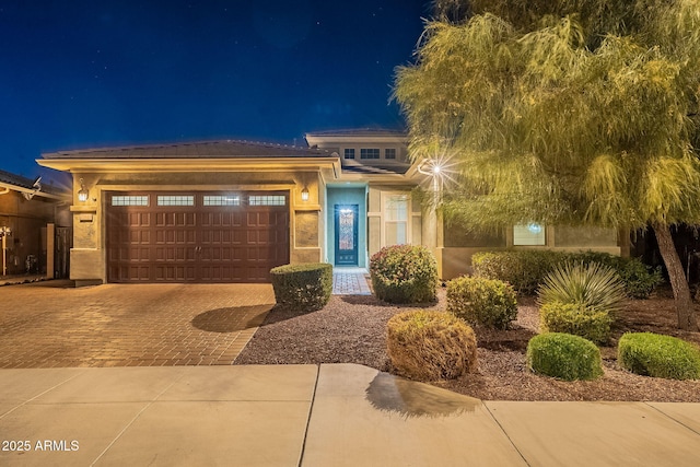 view of front of home with a garage