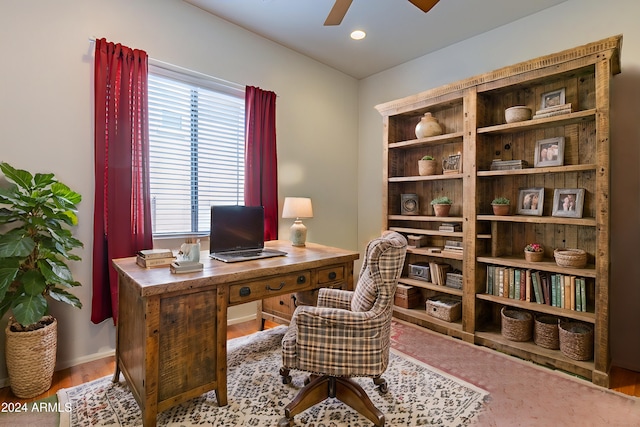 office area featuring light hardwood / wood-style floors and ceiling fan