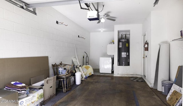 garage featuring a garage door opener, water heater, fridge, concrete block wall, and washer / dryer