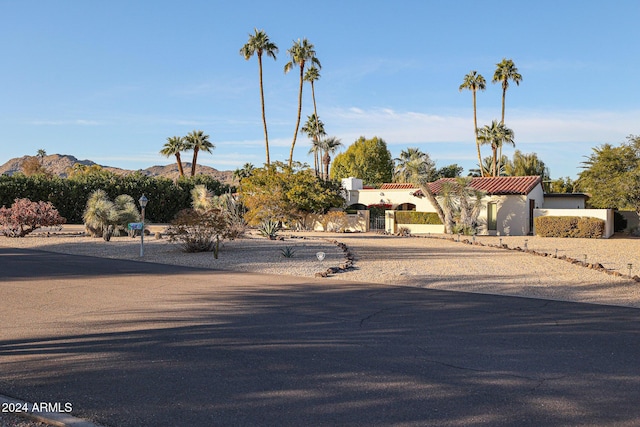 view of front of home featuring a mountain view