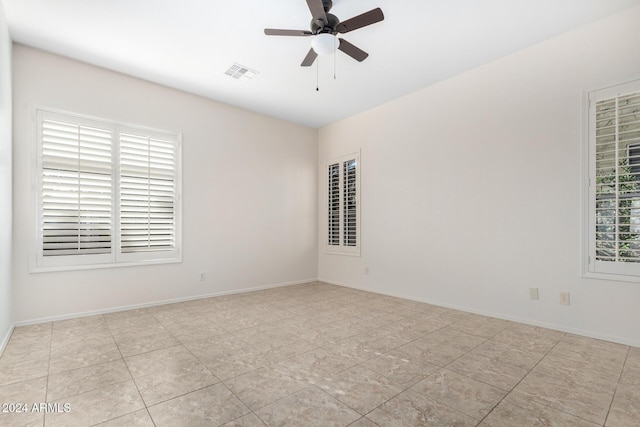 spare room featuring ceiling fan