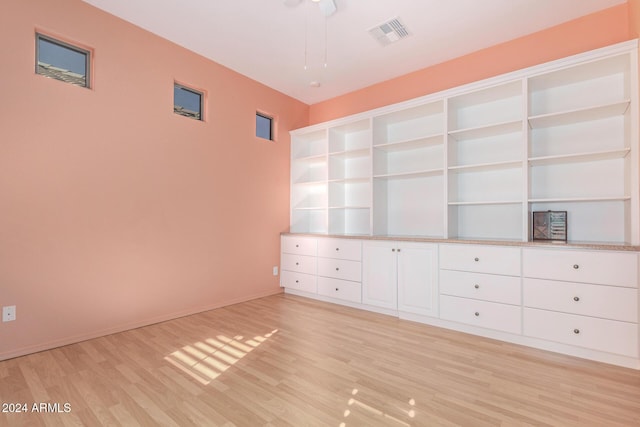 spare room featuring light wood-type flooring