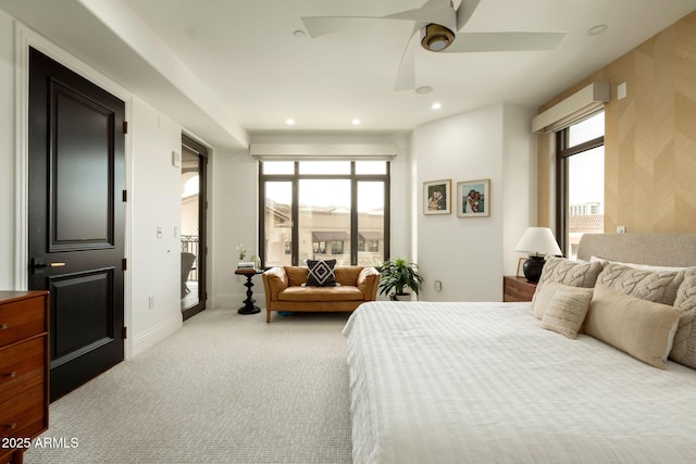 carpeted bedroom with recessed lighting, access to outside, multiple windows, and baseboards