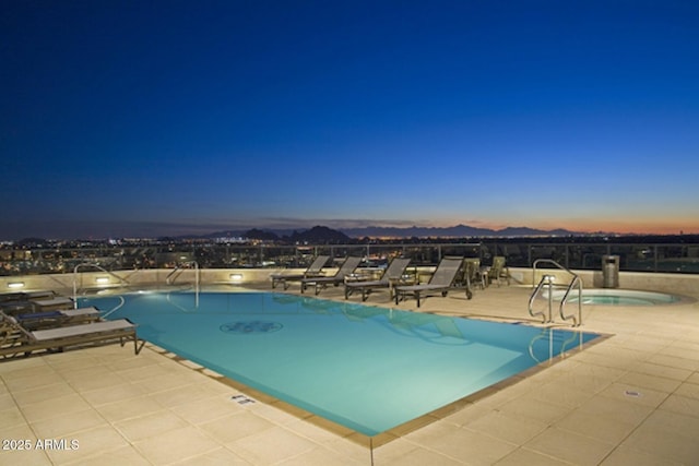 community pool featuring a patio area