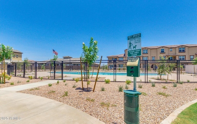 view of playground featuring a community pool