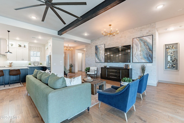 living area with recessed lighting, beamed ceiling, light wood-type flooring, and baseboards