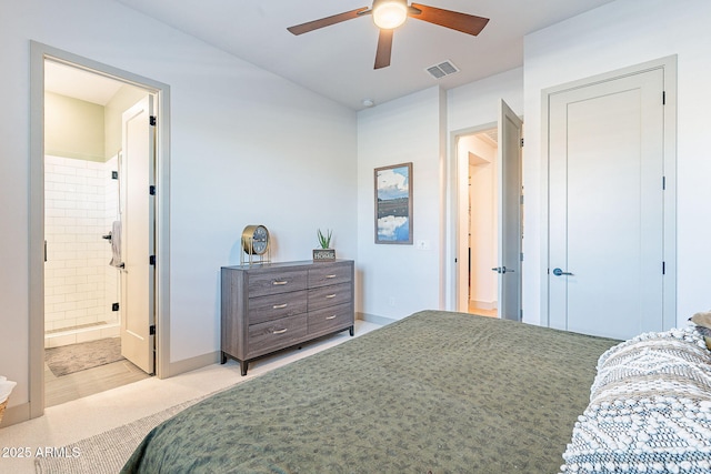 bedroom featuring light carpet, baseboards, visible vents, and ensuite bathroom