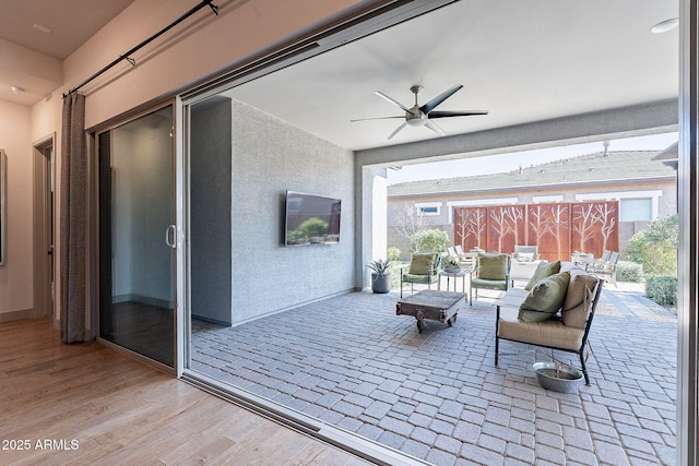 view of patio with a ceiling fan