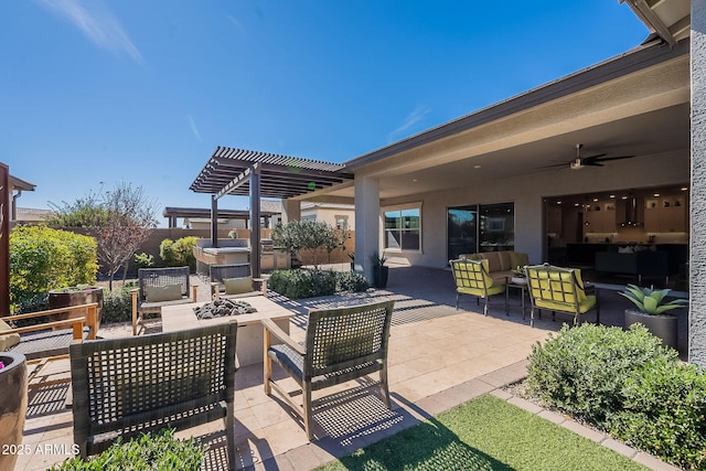 view of patio / terrace featuring ceiling fan, a pergola, and an outdoor living space with a fire pit