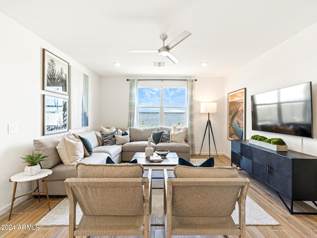 living room with ceiling fan