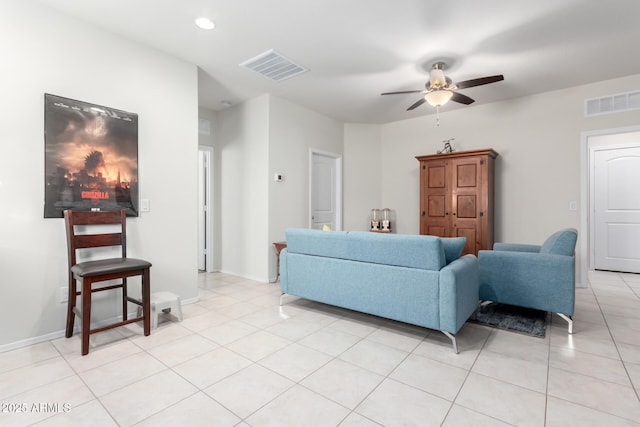 tiled living room featuring ceiling fan