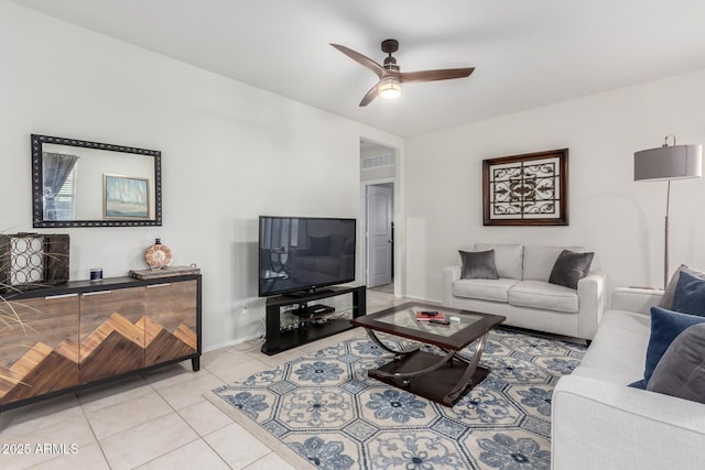 tiled living room with ceiling fan