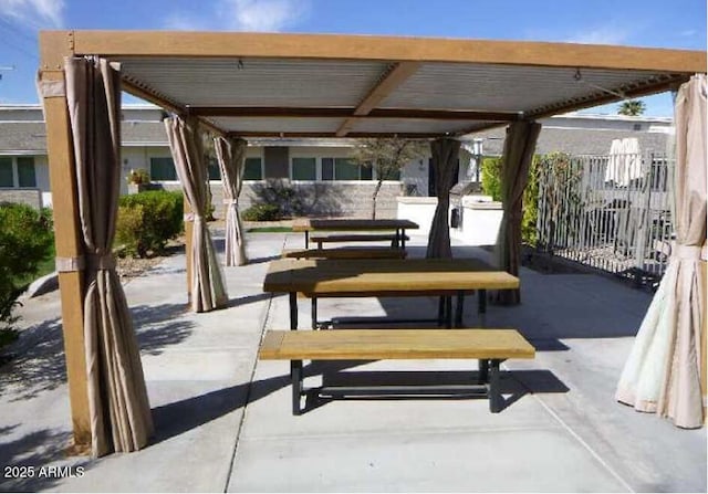 view of patio / terrace featuring outdoor dining area and a pergola