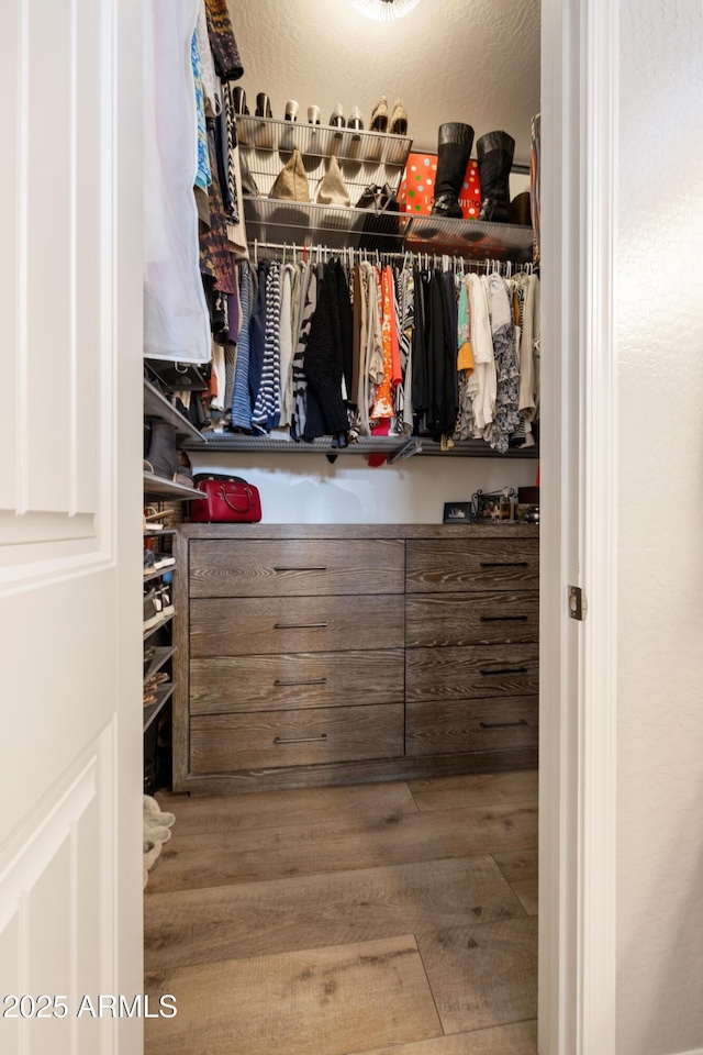 6135 E Livingston Loop, Prescott Valley, AZ 86314 - walk in closet with wood finished floors