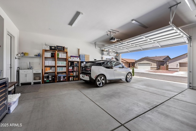 6135 E Livingston Loop, Prescott Valley, AZ 86314 - garage featuring a garage door opener