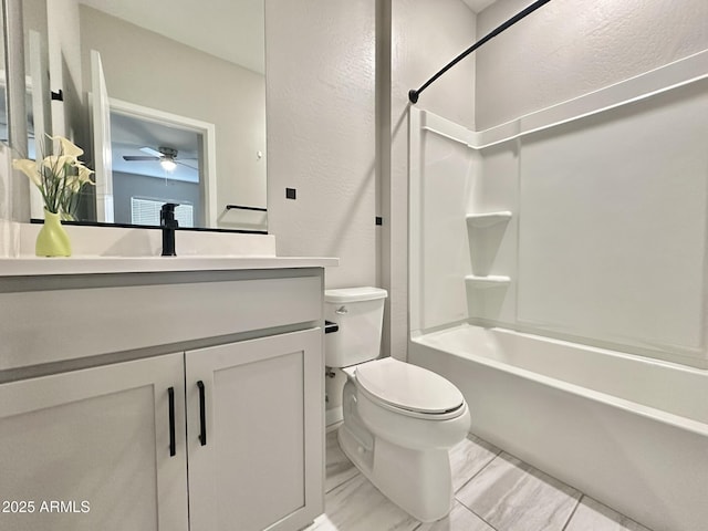 full bathroom with shower / bathtub combination, toilet, and vanity