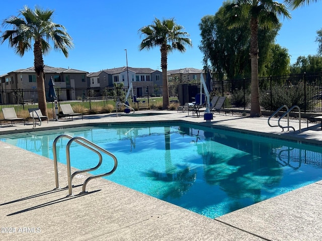 view of pool featuring a patio