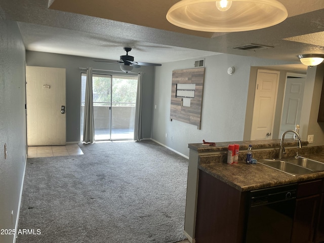 kitchen with sink, dishwasher, ceiling fan, dark brown cabinetry, and light colored carpet