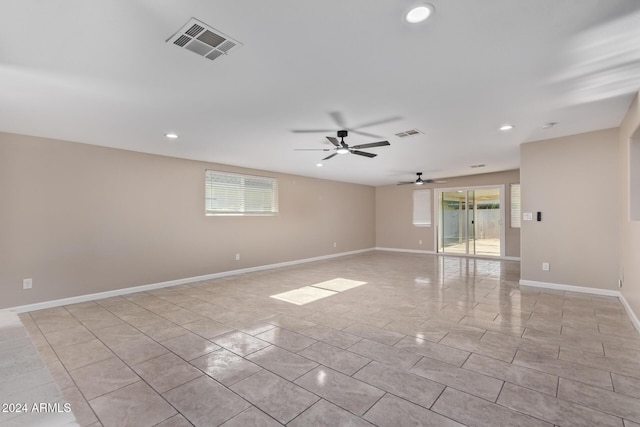 empty room featuring ceiling fan