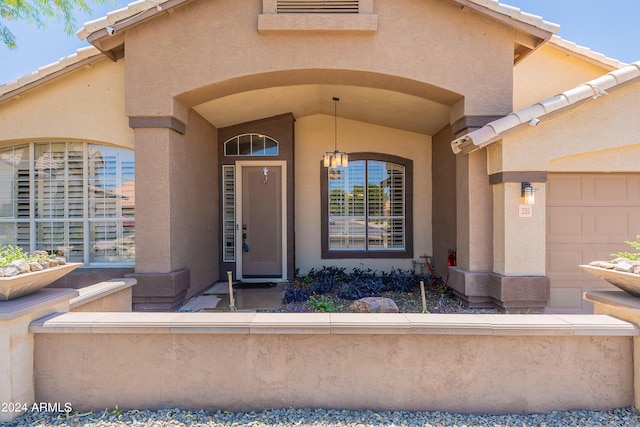 property entrance featuring a garage