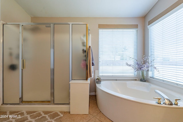 bathroom with tile patterned flooring and plus walk in shower