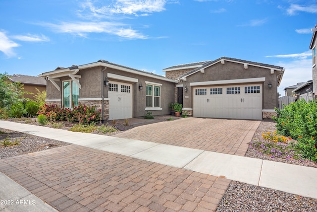 view of front of property featuring a garage