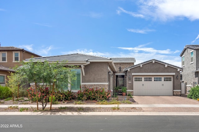 view of front of home with a garage