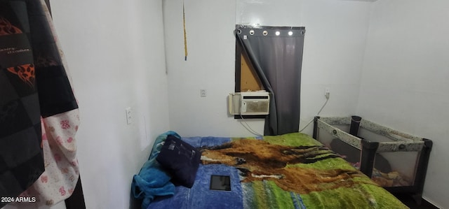 bedroom featuring cooling unit