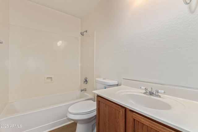 full bathroom featuring shower / bath combination, toilet, and vanity