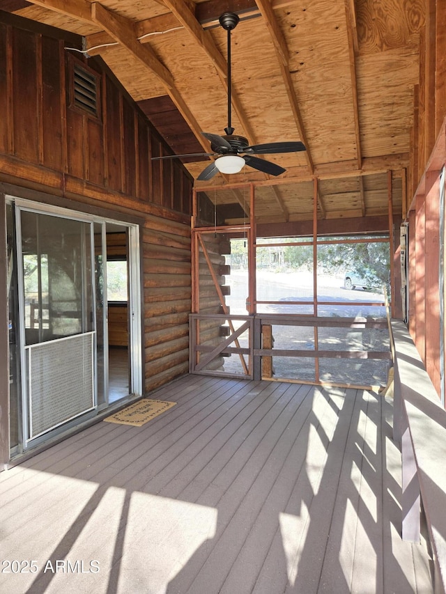 exterior space featuring visible vents and a ceiling fan