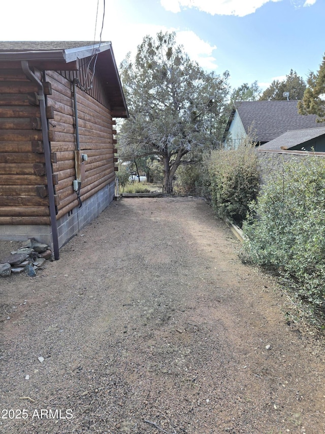 view of home's exterior with log exterior