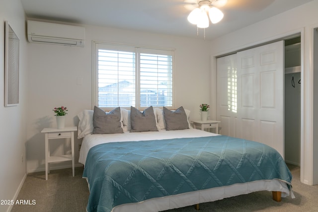 1894 E Julie Dr, Tempe, AZ 85283 - bedroom with a wall unit AC, carpet flooring, a closet, and baseboards