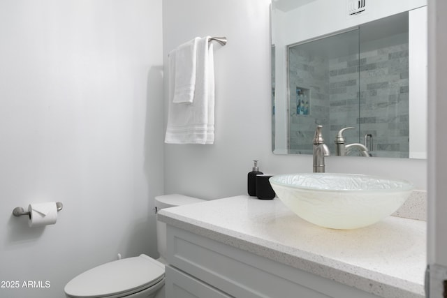 1894 E Julie Dr, Tempe, AZ 85283 - bathroom featuring vanity, toilet, and tiled shower
