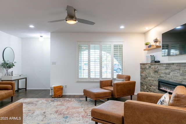 1894 E Julie Dr, Tempe, AZ 85283 - living area featuring wood finished floors, recessed lighting, baseboards, a ceiling fan, and a fireplace
