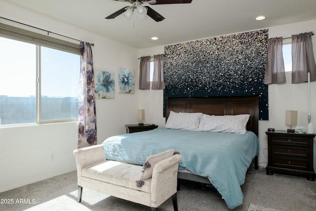 bedroom with recessed lighting, multiple windows, carpet floors, and a ceiling fan