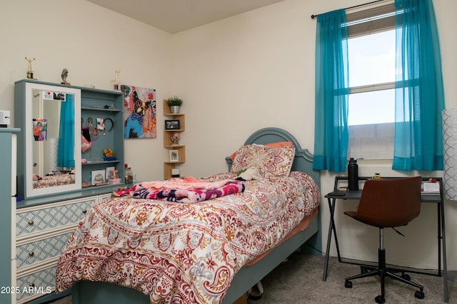 bedroom featuring carpet