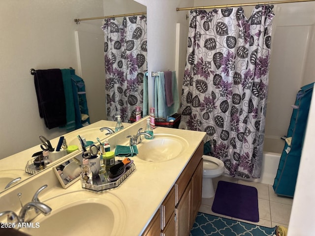 bathroom featuring a sink, shower / bathtub combination with curtain, toilet, and tile patterned floors