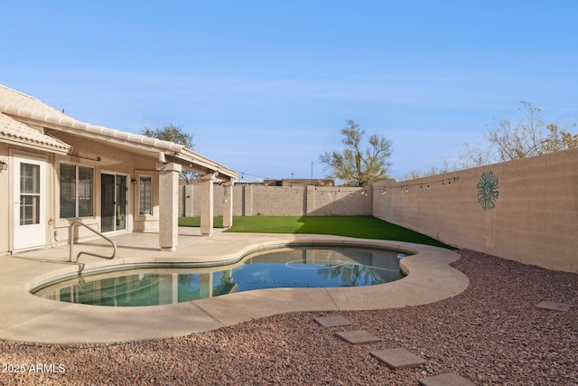 view of pool featuring a patio area