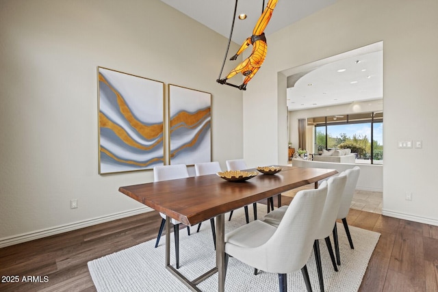 dining area with recessed lighting, wood finished floors, and baseboards